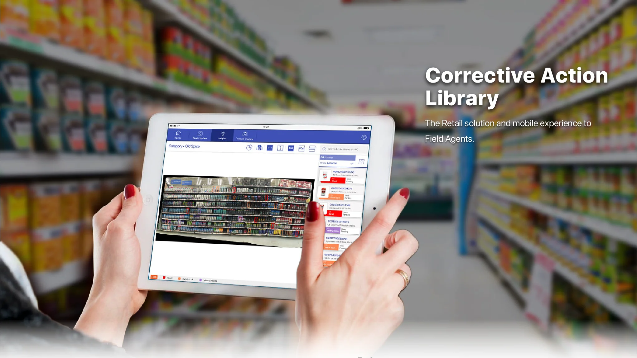 Hands holding a tablet with the Corrective Action Library app in a supermarket aisle